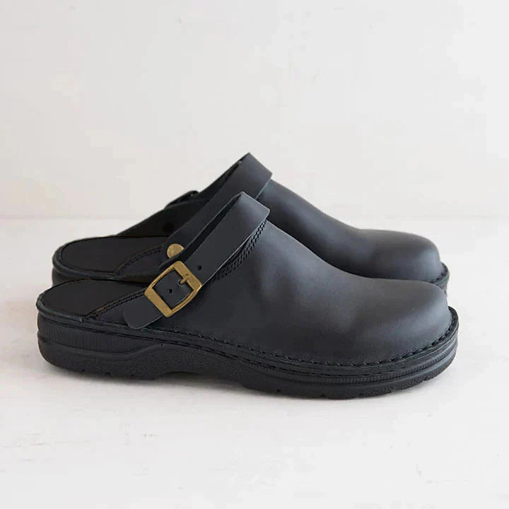Interior view of men's orthopedic comfort clogs, highlighting ergonomic arch support for foot pain relief.