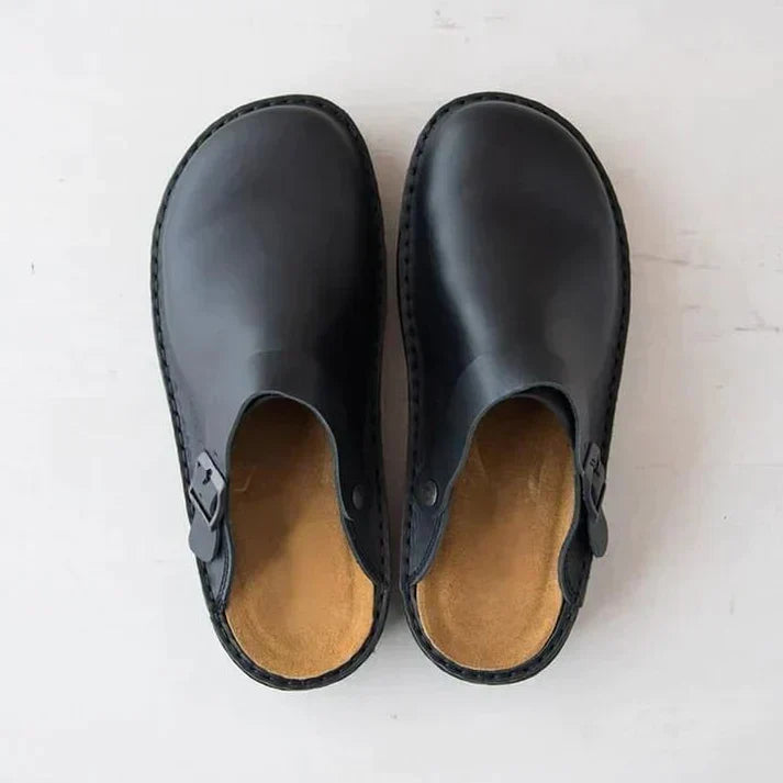 Slip-resistant sole on men's orthopedic clogs, ensuring safety & durability for work and daily activities.