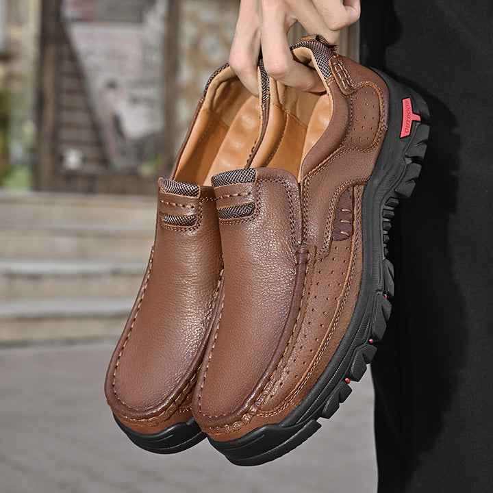 Men's Orthopedic Comfort Transition Boots, grey suede, on a wooden floor, emphasizing comfort footwear