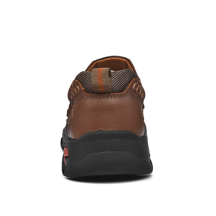 Men's Orthopedic Comfort Transition Boot in a stylish dark blue leather, suitable for various outfits