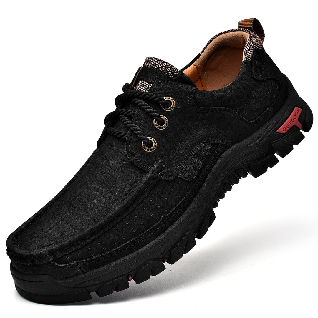 Pair of men's orthopedic black boots, front top view, comfortable, supportive