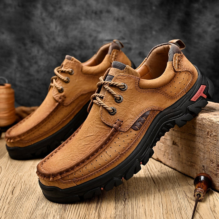Durable men's orthopedic boots, lace-up style, built for outdoor adventures