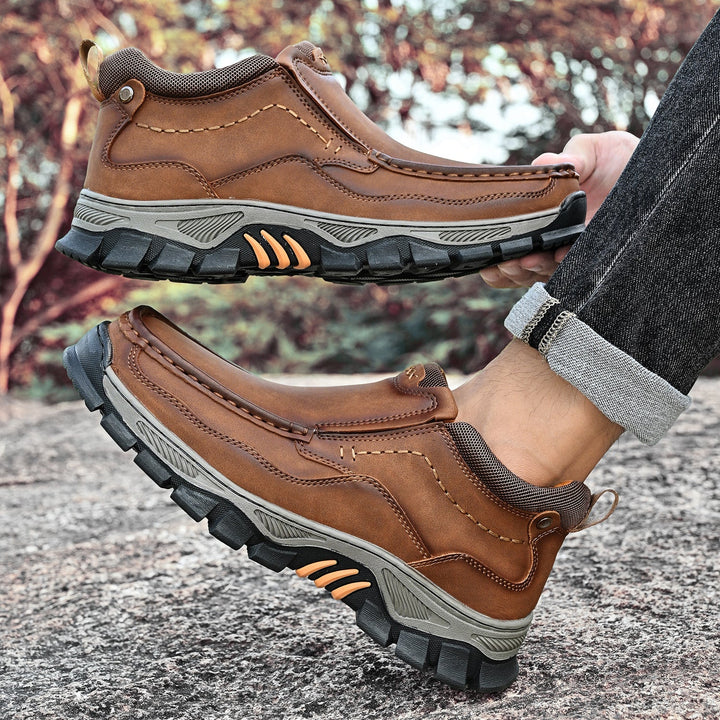 Casual men's leather slip-on boots with orthopedic support and anti-slip features