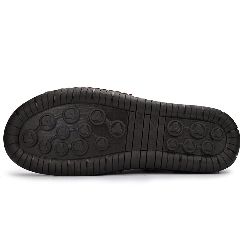 Close-up of the zipper on men's orthopedic outdoor leather boots, secure and functional
