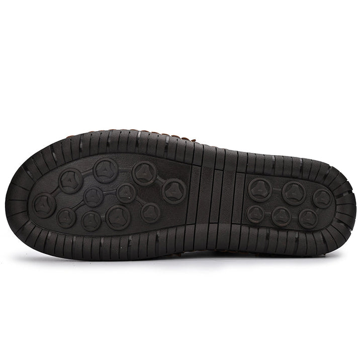 Close-up of the zipper on men's orthopedic outdoor leather boots, secure and functional