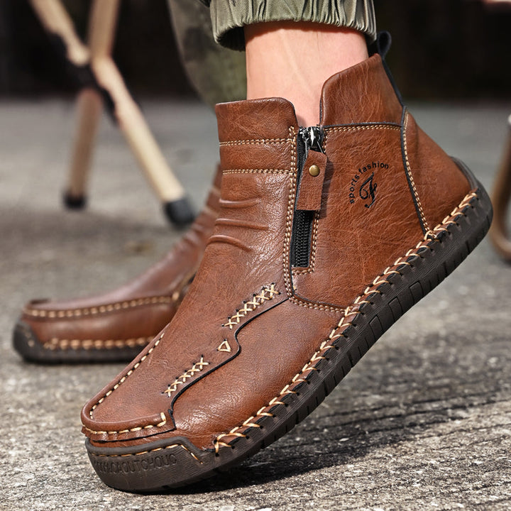 Close-up of the slip-resistant sole on men's orthopedic outdoor zipper boots, brown