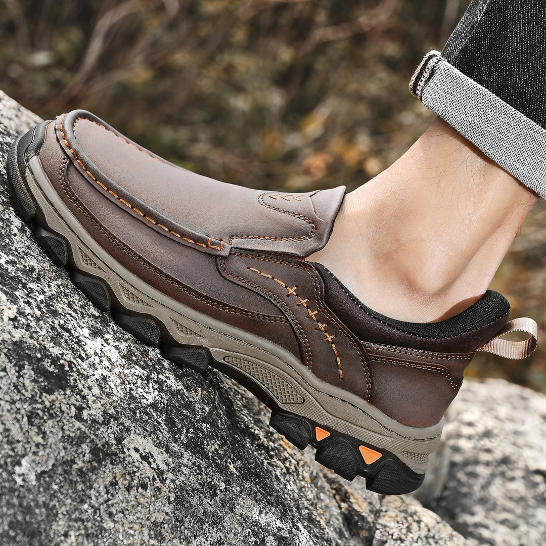 Close-up of the breathable leather upper on men's orthopedic slip-on walking shoes