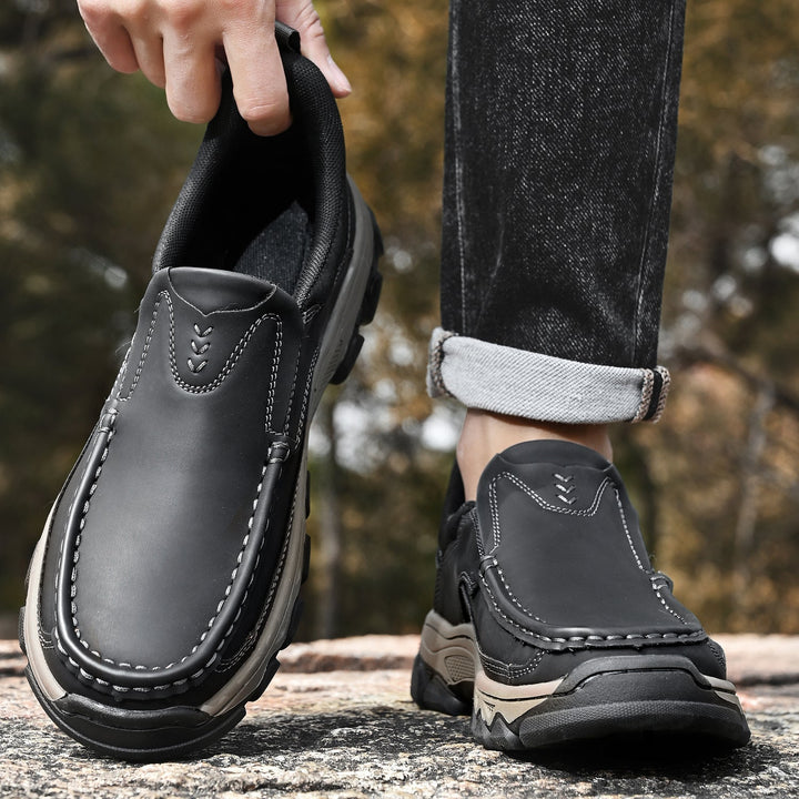 Tan men's orthopedic leather slip-ons, offering support and style for various occasions