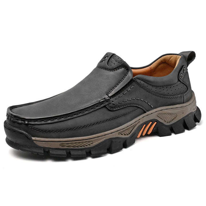 Top-down view of comfortable men's orthopedic boots, genuine leather, for posture support