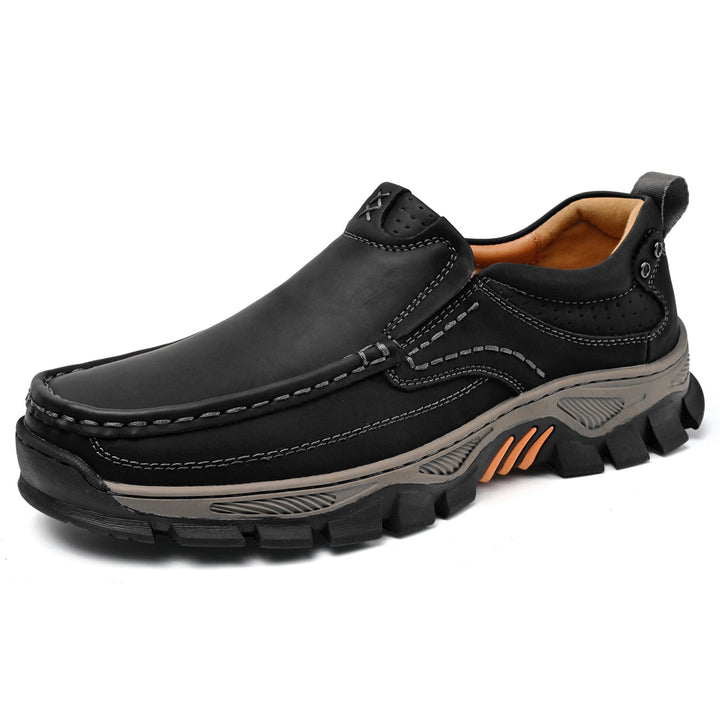Man tying laces on comfortable brown orthopedic boots, transition style, slip-resistant sole