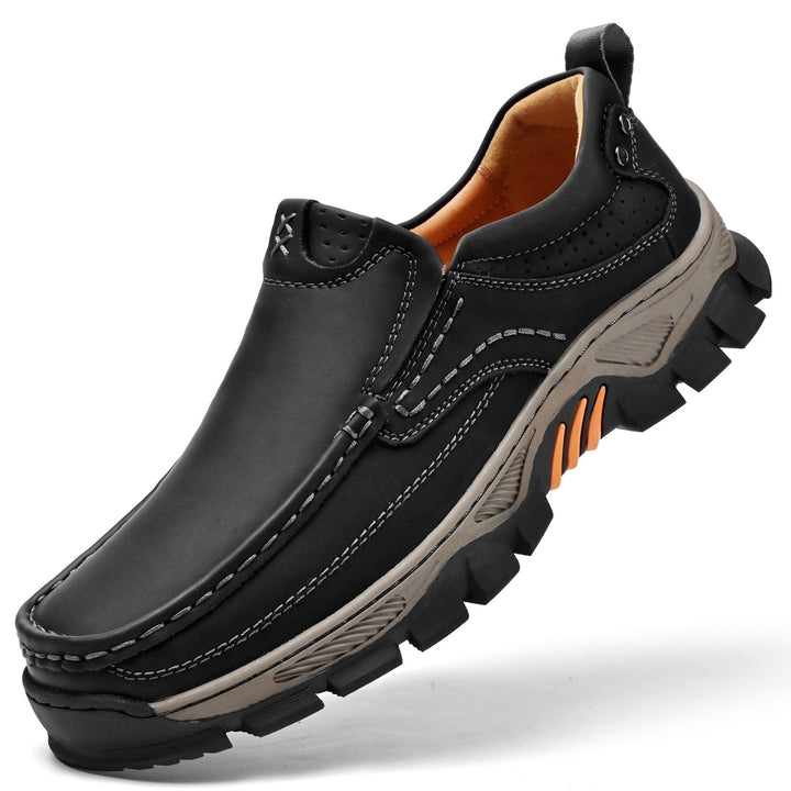 Orthopedic men's boots in a professional setting, comfortable black leather, dress footwear