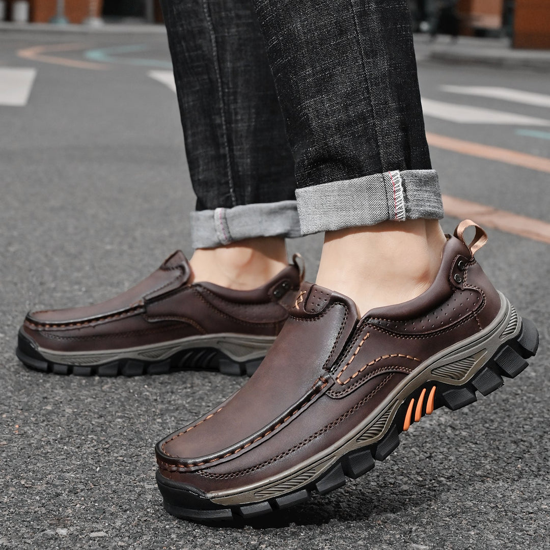 Rear view of men's orthopedic boots, showing sole and comfortable heel support