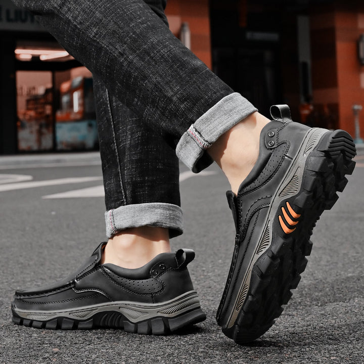Man's feet in comfortable brown orthopedic boots, relaxed pose, posture support benefits