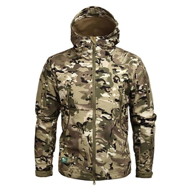 Man hiking in a men's outdoor camouflage hooded jacket, suitable for winter conditions