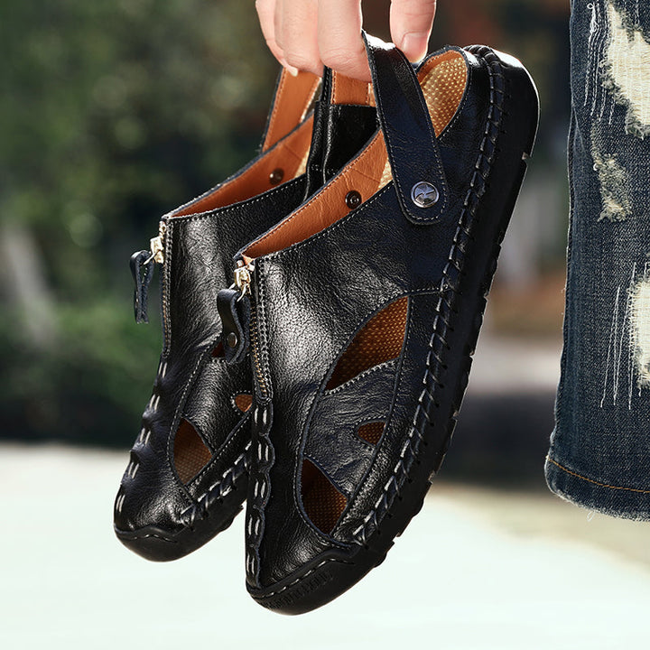 Packaging shot of men's closed-toe leather beach sandals