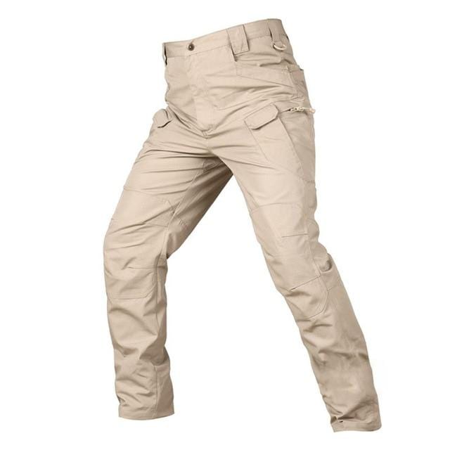 Man wearing men's outdoor ripstop tactical cargo pants, demonstrating fit and multiple utility pockets.