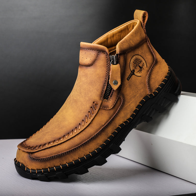 Top-down view of men's classic leather outdoor boots with orthopedic comfort features