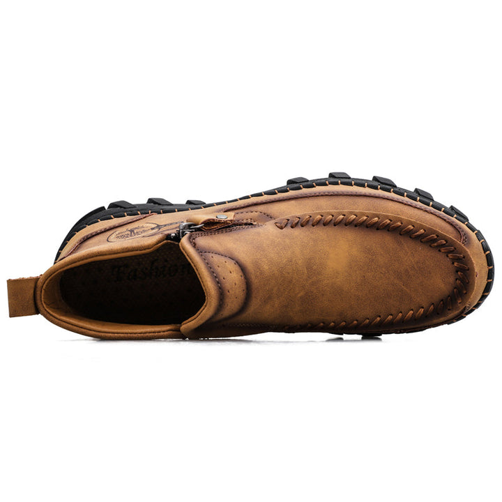 Side profile of men's slip-resistant work boots with orthopedic support, rugged design