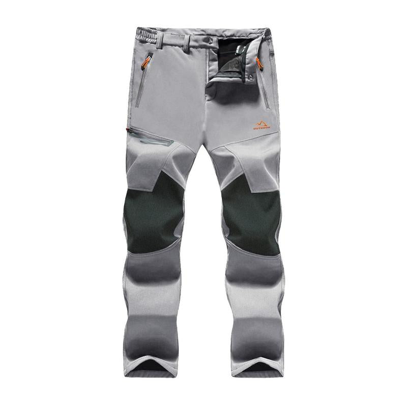 Close-up of men's water-resistant trekking pants, ideal for outdoor and hiking