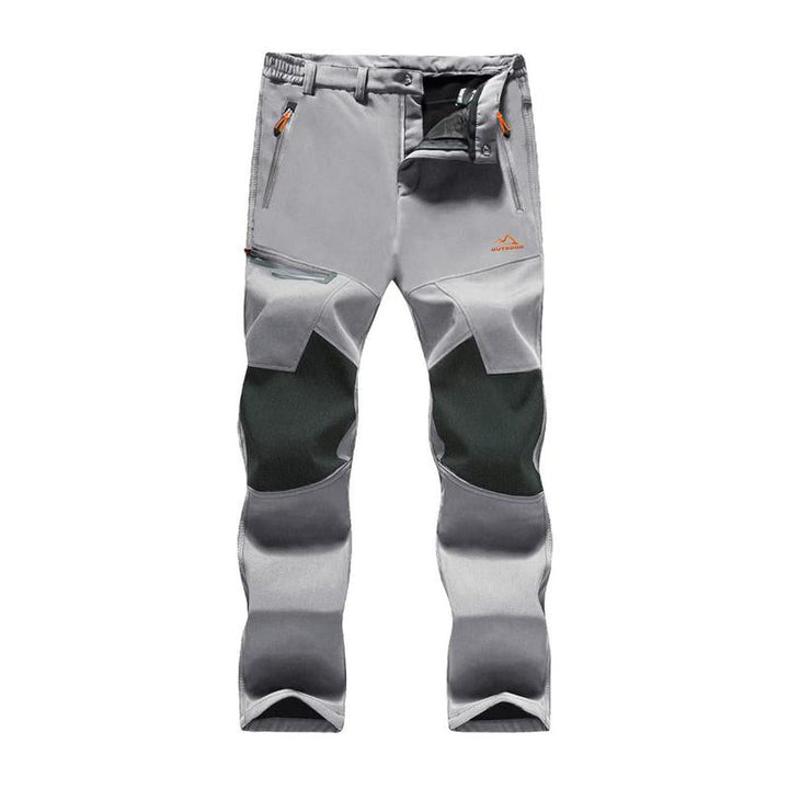 Close-up of men's water-resistant trekking pants, ideal for outdoor and hiking