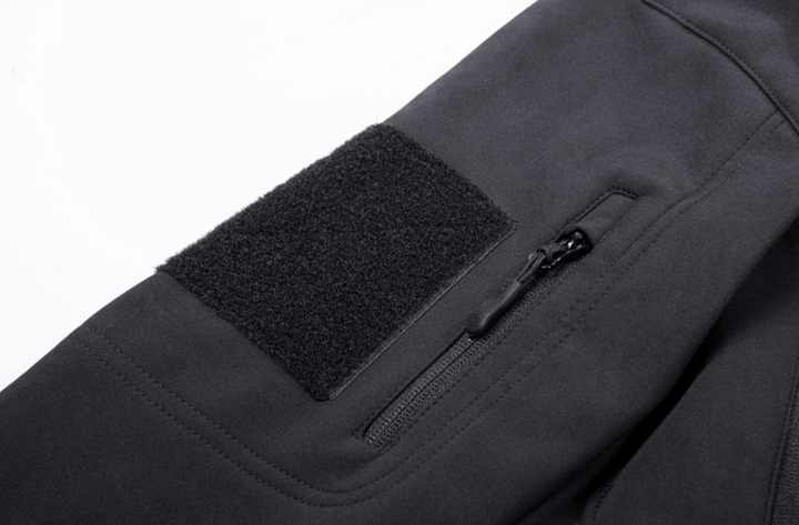 Zoomed-in shot of the waterproof zipper on a Men's Insulated Travel Jacket, essential for weatherproof protection