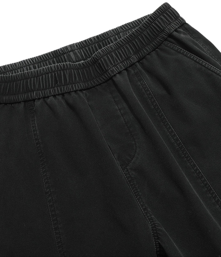 Close-up of Men's Performance Athletic Jogger Pants fabric texture, highlighting stretch & breathability