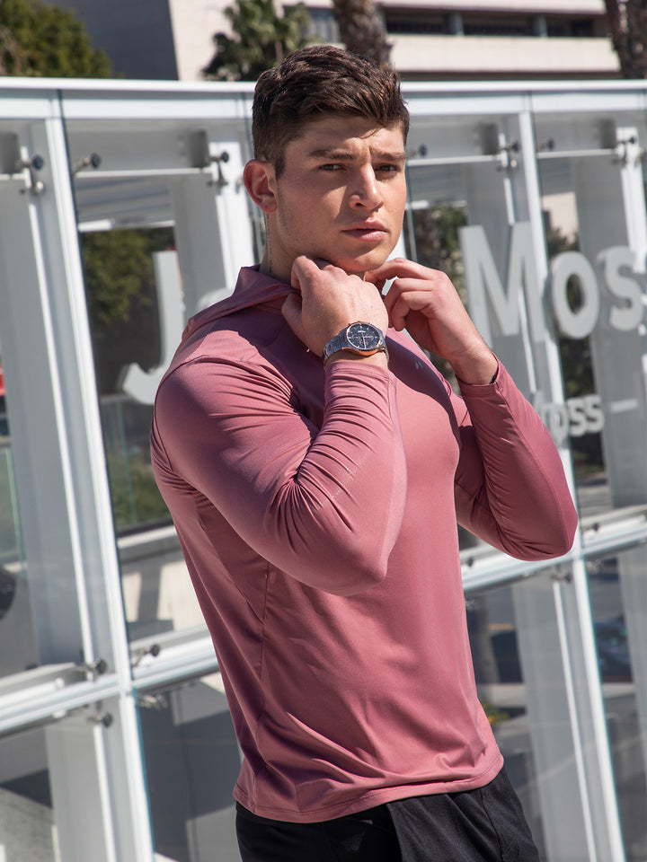 Rear view of men's royal blue performance baselayer hoodie, showing athletic cut