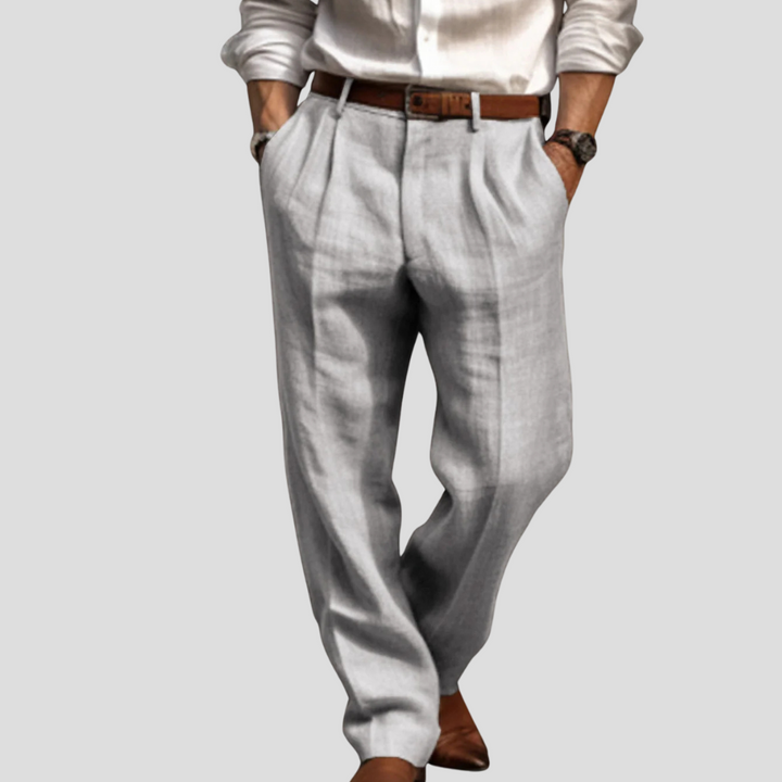 Stylish men's pleated linen trousers, perfect for smart casual outfits. Comfortable and breathable summer pants.