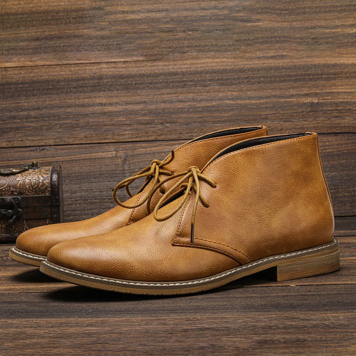 Stylish men's black leather dress boots, perfect for adding sophistication to any outfit. 