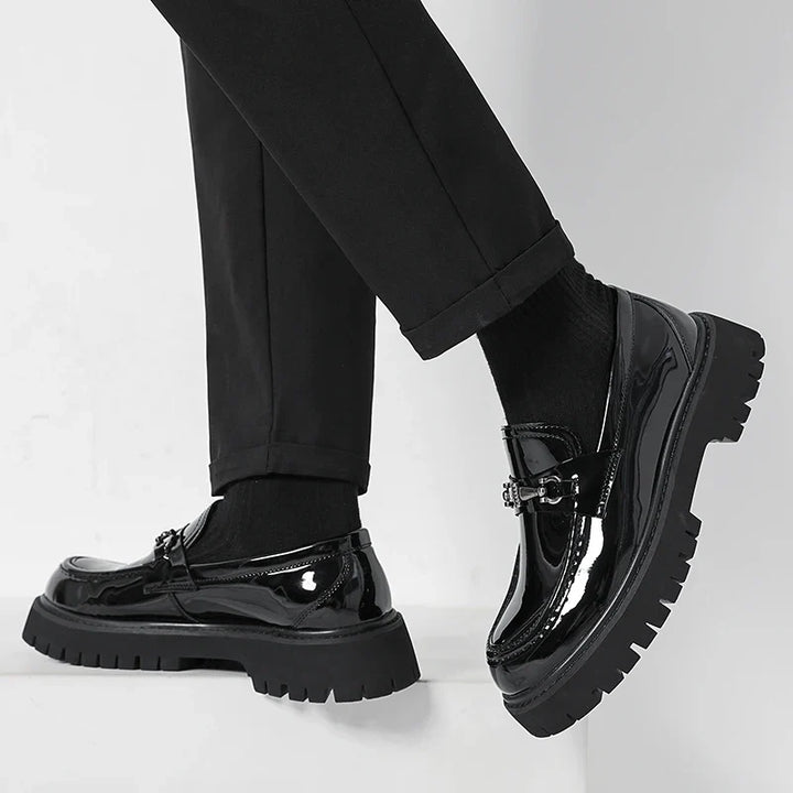 Elegant men's polished dress loafers, ideal professional footwear for formal events and ceremonies.