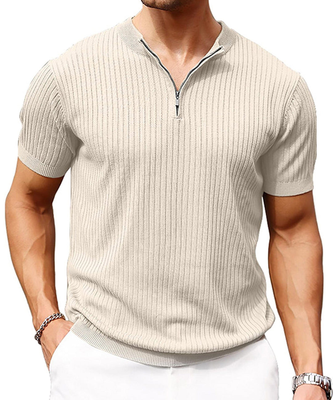 Stack of folded men's polyester zip-up shirts; ready for casual wear.