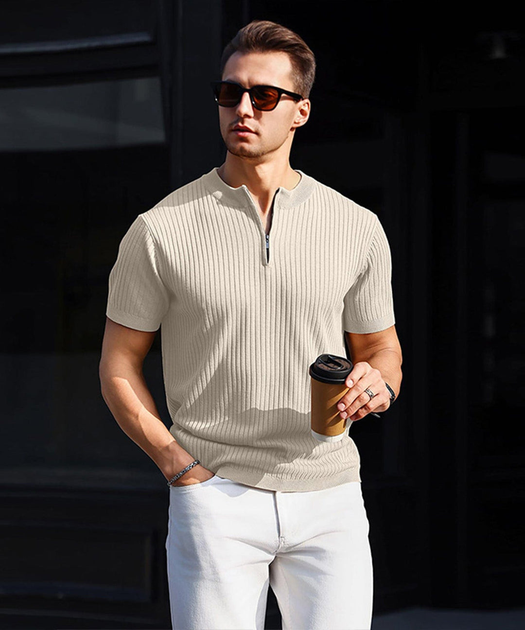 Close-up of the hem of a men's modern fit zip-up shirt; quality men's apparel.