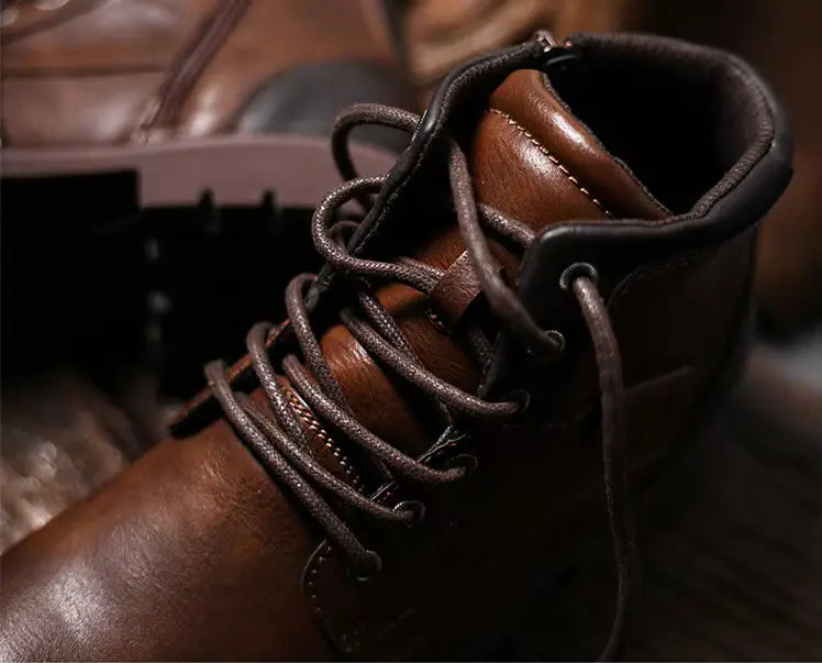 Elegant men's black leather ankle boots, featuring a sleek design and cushioned support