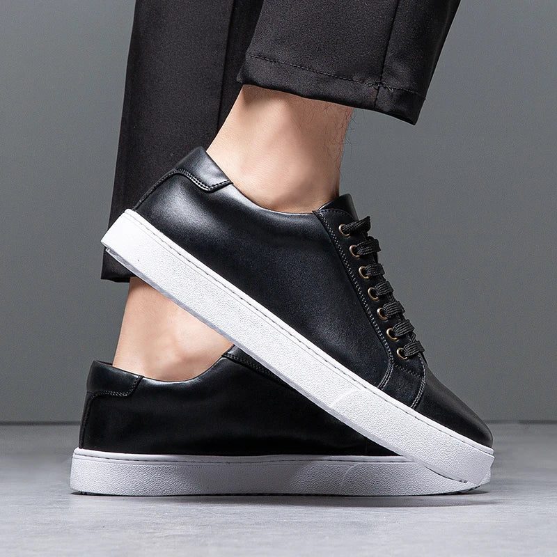 Men's white leather sneakers, clean and minimalist design, versatile casual footwear