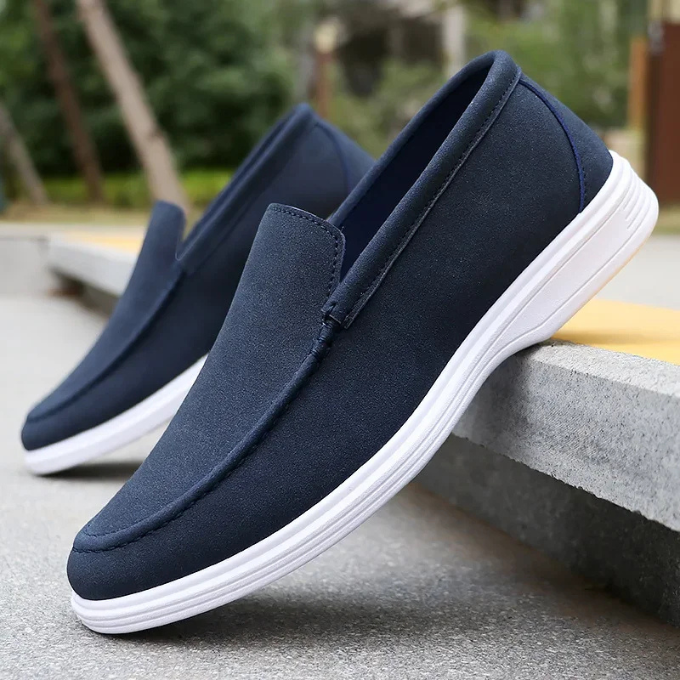 Men's premium suede loafers in brown, gray, and blue, a collection of comfortable and stylish footwear options.