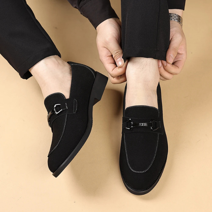 Men's comfortable beige suede loafers, designed for easy slip-on wear and casual dress.