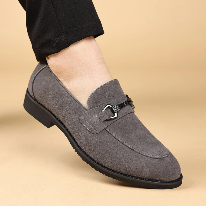 Men's grey suede slip-on loafers, offering comfort and sophisticated style for everyday.