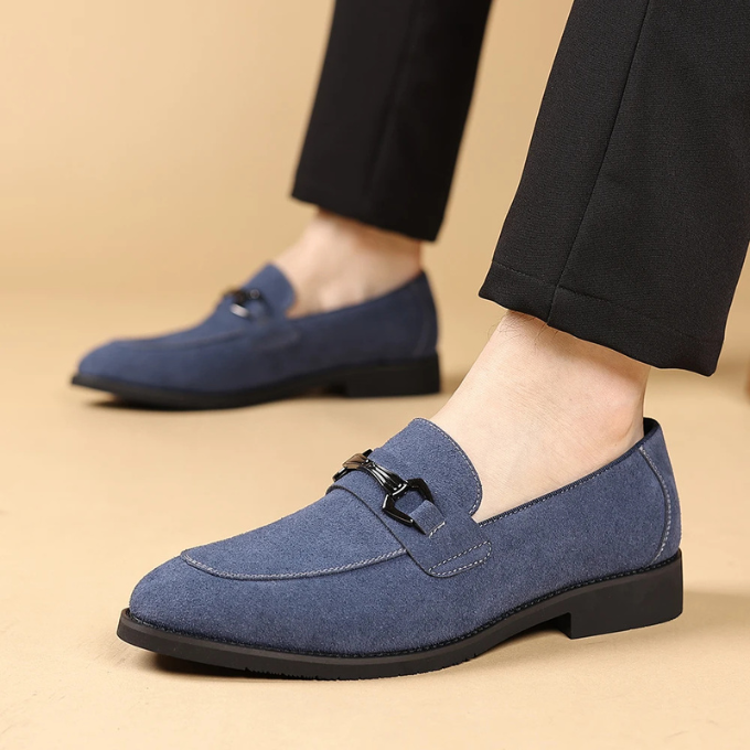 Pair of tan suede loafers for men, a versatile slip-on shoe for smart casual outfits.