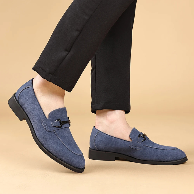 Stylish men's green suede loafers, perfect for adding an elegant touch to any look.