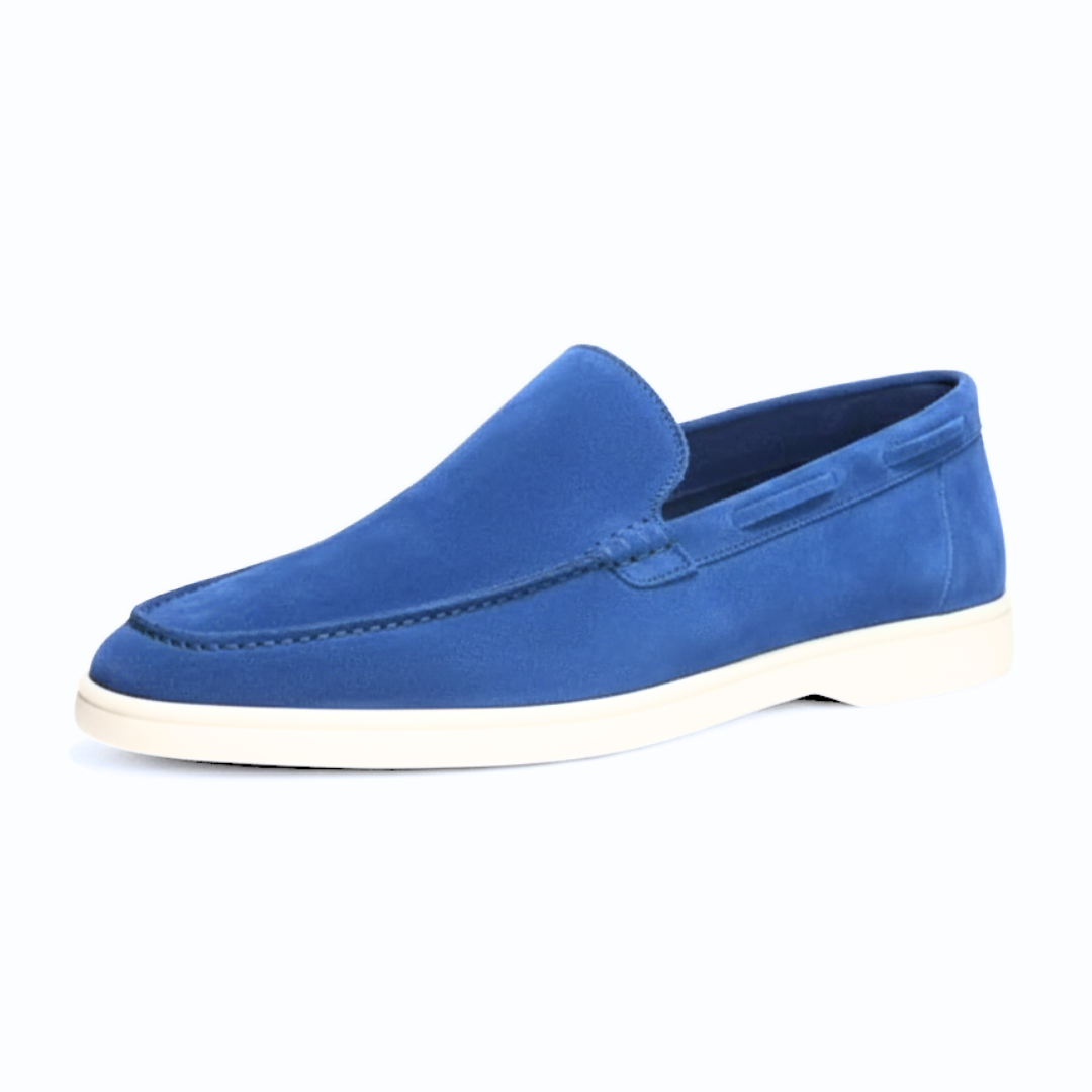 Detail shot of the craftsmanship on men's premium suede slip-on loafers, emphasizing quality and comfort.