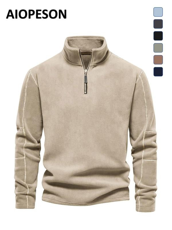Close-up of the brushed texture on a men's premium microfleece quarter zip, highlighting softness