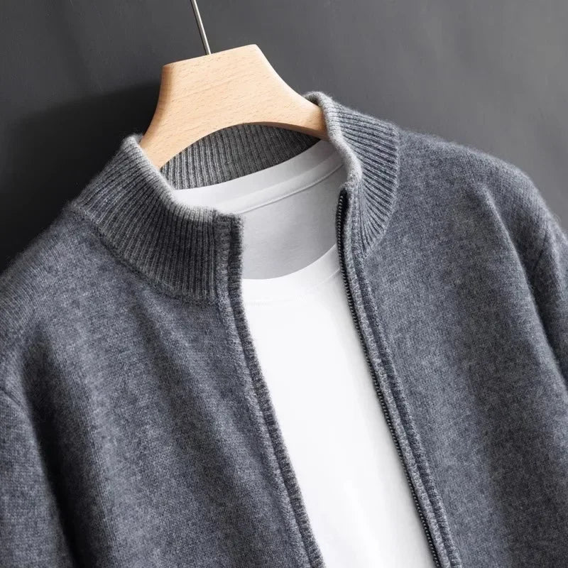 Detail shot of the zipper closure on a men's cashmere blend jacket, emphasizing smooth functionality.