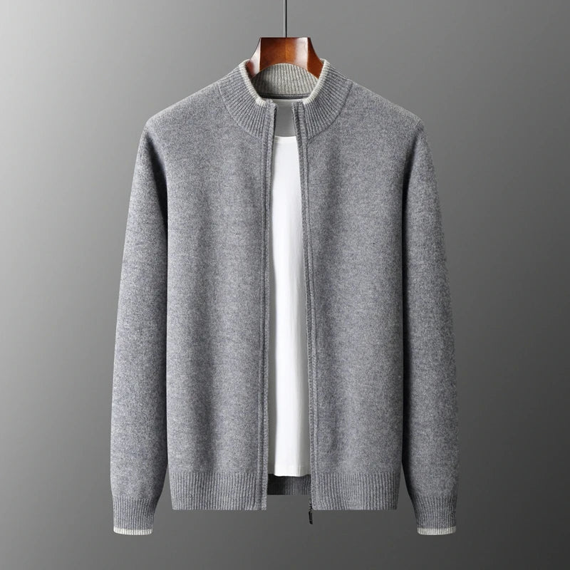 Men's cashmere blend zip jacket in navy blue, folded neatly, showing its soft and premium knitwear quality.