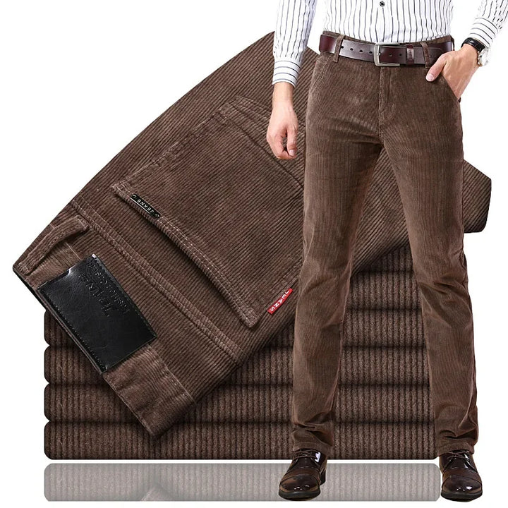 Men's premium corduroy tailored trousers in a rich brown color, ideal for smart casual or formal wear.