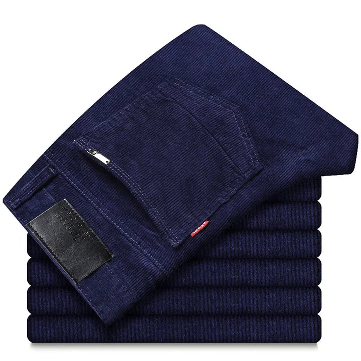 Stylish men's tailored corduroy trousers in a classic black, versatile for both casual and formal occasions.
