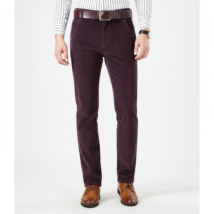 Rear view of men's elegant corduroy tailored trousers, showing a well-fitted silhouette and pocket detail.