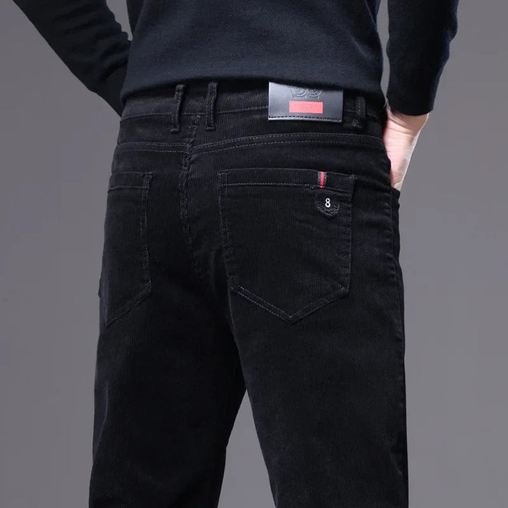 Model wearing men's premium corduroy tailored trousers in a modern fit, suitable for mensfashion.
