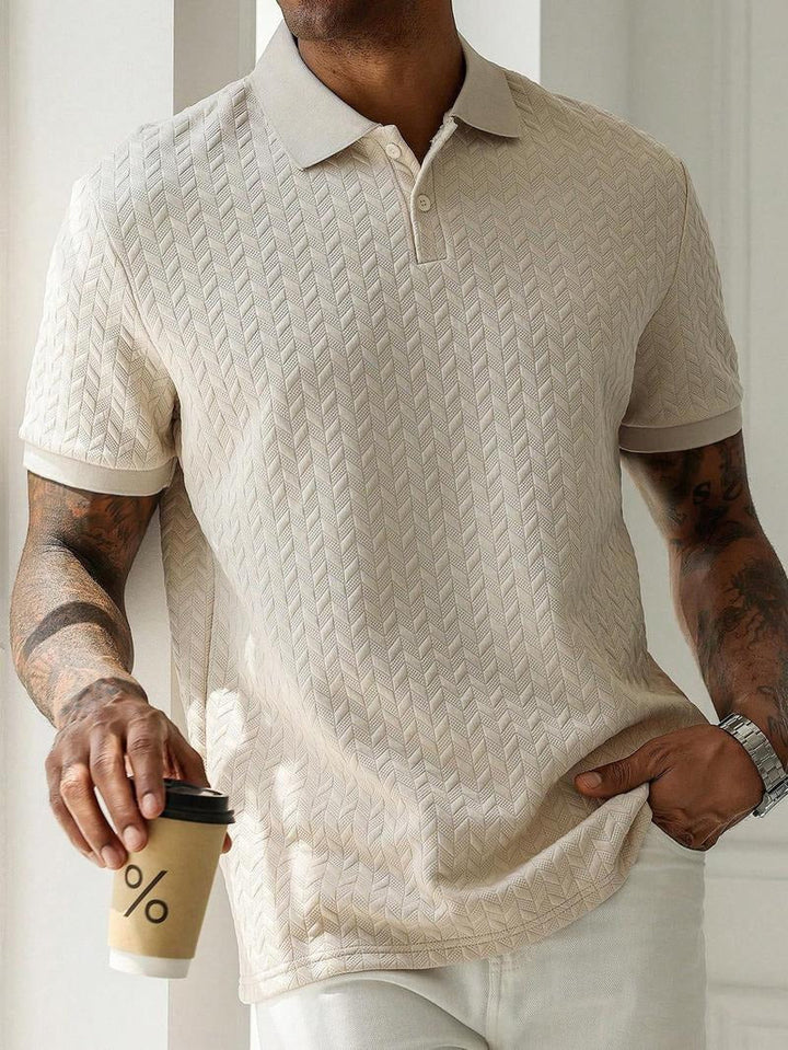 Casual men's cotton blend polo in a breathable fabric with subtle textured design, perfect for summer