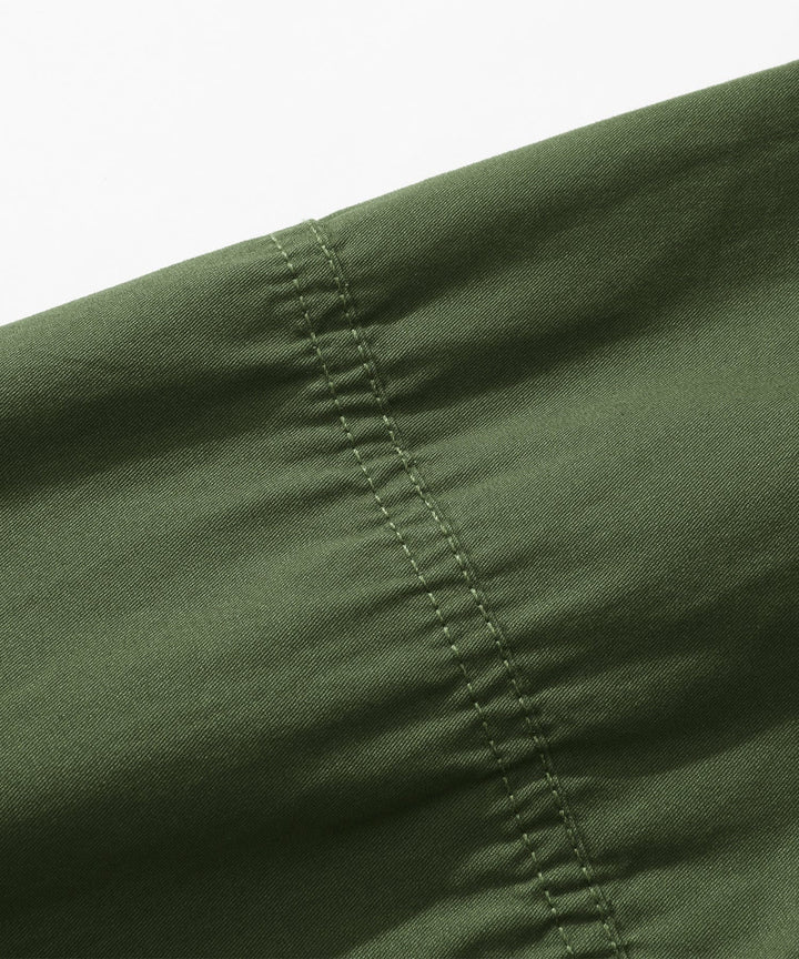 Close-up of the chest pocket detail on the Men's Premium Cotton Terrain Trek Shirt, functional apparel.