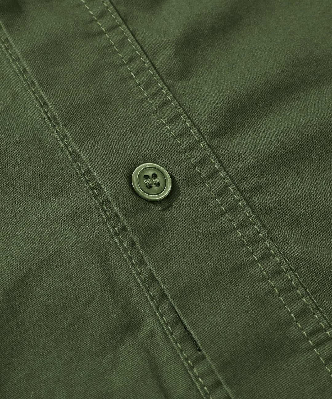 Lifestyle shot of a man enjoying comfort in his Men's Premium Cotton Terrain Trek Shirt outdoors.